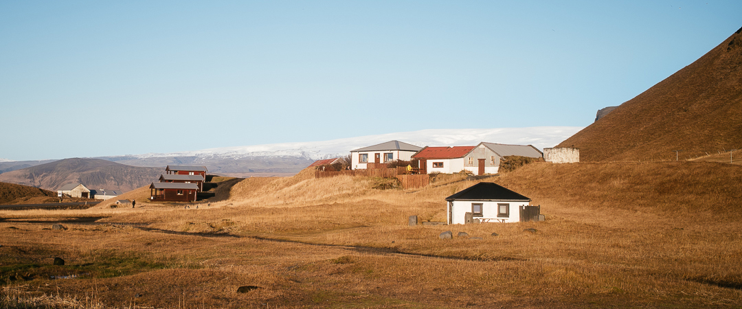 Mýrdalsjökull behind some buildings
